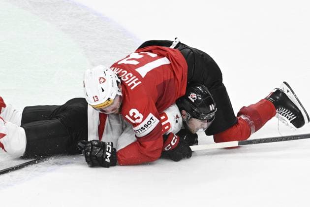 L-R Nico Hischier (SUI) and Andrew Mangiapane (CAN) in action during the 2024 IIHF World Championship, WM, Weltmeisterschaft semi-final match Canada vs Switzerland, in Prague, Czech Republic, on May 25, 2024. (CTKxPhoto MichalxKamaryt) CTKPhotoP2024052506943  CTKPhotoP2024052506943