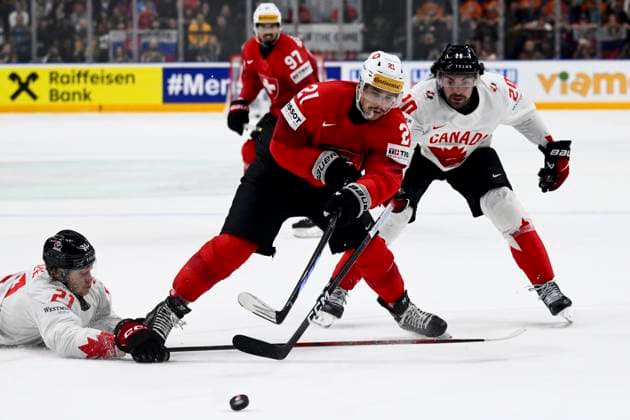 L-R Kaiden Guhle (CAN), Kevin Fiala (SUI) and Nick Paul (CAN) in action during the 2024 IIHF World Championship, WM, Weltmeisterschaft semi-final match Canada vs Switzerland, in Prague, Czech Republic, on May 25, 2024. (CTKxPhoto OndrejxDeml) CTKPhotoP2024052507111  CTKPhotoP2024052507111