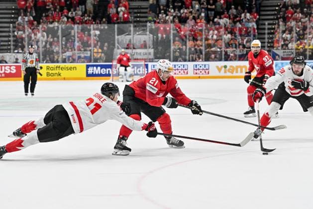 PRAGUE, CZECH REPUBLIC MAY 25 Kevin Fiala of Switzerland protects the puck from Kaiden Guhle of Canada during the 2024 IIHF Ice Hockey World Championship Czechia Semifinal match between Canada and Switzerland at Prague Arena on May 25, 2024 in Prague, Czech Republic Prague Prague Arena Czech Republic Copyright: xJustPictures.ch AndreaxBrancax jp-en-EuSpIm-AB_25052024_AAB_6111