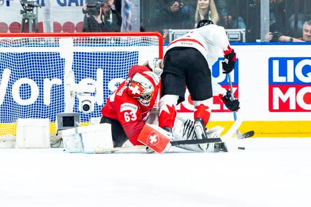PRAGUE, CZECH REPUBLIC MAY 25 goalkeeper Leonardo Genoni of Switzerland L saves on Owen Power of Canada during the 2024 IIHF Ice Hockey World Championship Czechia Semifinal match between Canada and Switzerland at Prague Arena on May 25, 2024 in Prague, Czech Republic Prague Prague Arena Czech Republic Copyright: xJustPictures.ch JarixPestelaccix jp-en-EuSpIm-JP4_JAR_Canada_Switzerland_25May_2024401