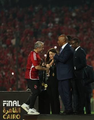 CAIRO, EGYPT - MAY 25: Al Ahly head coach Marcel Koller receiving gold medal from CAF President Patrice Motsepe after wining the CAF Champions League Final Second Leg match between Al Ahly and Esperance Sportive Tunis at Cairo International Stadium on May 25, 2024 in Cairo, Al Ahly v Esperance Sportive Tunis: Final Second Leg - CAF Champions League Copyright: xPhotoxbyxM.Bayoumy SFSIx