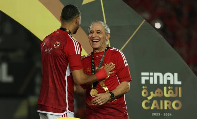 CAIRO, EGYPT - MAY 25: head coach Marcel Koller celebrate on stage with a trophy after wining the CAF Champions League Final Second Leg match between Al Ahly and Esperance Sportive Tunis at Cairo International Stadium on May 25, 2024 in Cairo, Al Ahly v Esperance Sportive Tunis: Final Second Leg - CAF Champions League Copyright: xPhotoxbyxM.Bayoumy SFSIx