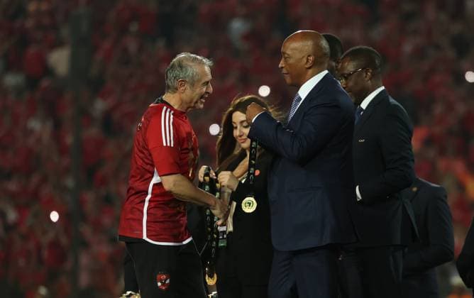 CAIRO, EGYPT - MAY 25: head coach Marcel Koller celebrate on stage with a gold medal after wining the CAF Champions League Final Second Leg match between Al Ahly and Esperance Sportive Tunis at Cairo International Stadium on May 25, 2024 in Cairo, Al Ahly v Esperance Sportive Tunis: Final Second Leg - CAF Champions League Copyright: xPhotoxbyxM.Bayoumy SFSIx