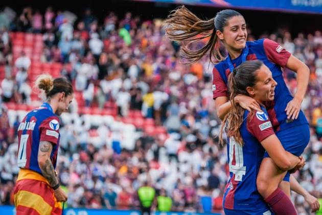 UEFA Women s Champions League 2024 Final: FC Barcelona, Barca Femeni vs. Olympique Lyonnais Feminin Martina Fernandez and Jana Fernandez celebrate, as Barcelona are crowned Champions of Europe after the UEFA Women s Champions League final match between FC Barcelona Femeni and Olympique Lyonnais Feminin on May 25 2024, in Bilbao, Spain Bilbao Estadio de San Mames Bilbao Spain Copyright: xAlexandraxFechetex _ADR6031