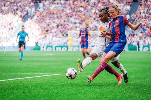 UEFA Women s Champions League 2024 Final: FC Barcelona, Barca Femeni vs. Olympique Lyonnais Feminin Melchie Dumornay and Irene Paredes in action during the UEFA Women s Champions League final match between FC Barcelona Femeni and Olympique Lyonnais Feminin on May 25 2024, in Bilbao, Spain Bilbao Estadio de San Mames Bilbao Spain Copyright: xAlexandraxFechetex _ADR8683