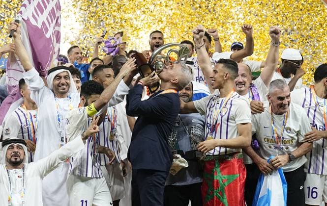 Football: ACL final Al Ain head coach Hernan Crespo (C) and his players celebrate after winning the Asian Champions League football title with a 5-1 victory over Yokohama F Marinos in the return leg of the final in Al Ain, the United Arab Emirates, on May 25, 2024.  A14AA0002914556P