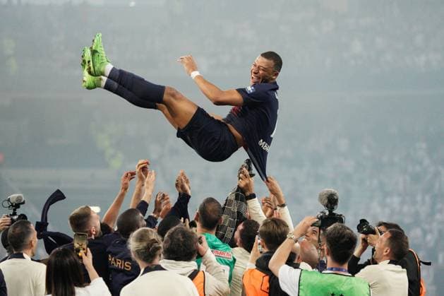 Kylian Mbappe of PSG is thrown in the air by his teammates after playing his last game for the club in their 2-1 victory Lyon v Paris Saint-Germain, Coupe de France, Final, Football, Stade Pierre-Mauroy, Lille, Paris - 25 May 2024 EDITORIAL USE ONLY No use with unauthorised audio, video, data, fixture lists, club league logos or live services. Online in-match use limited to 120 images, no video emulation. No use in betting, games or single club league player publications. Copyright: xDavexWinter Shutterstockx 14506126ll