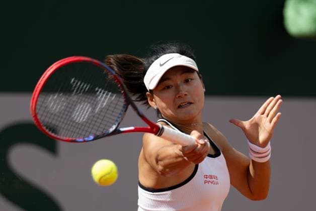 (240526) -- PARIS, May 26, 2024 -- Wang Yafan of China hits a return during the women s singles first round match between Wang Yafan of China and Maria Timofeeva of Russia at the French Open tennis tournament at Roland Garros, Paris, France, May 26, 2024. ) (SP)FRANCE-PARIS-TENNIS-FRENCH OPEN-WOMEN S SINGLES MengxDingbo 