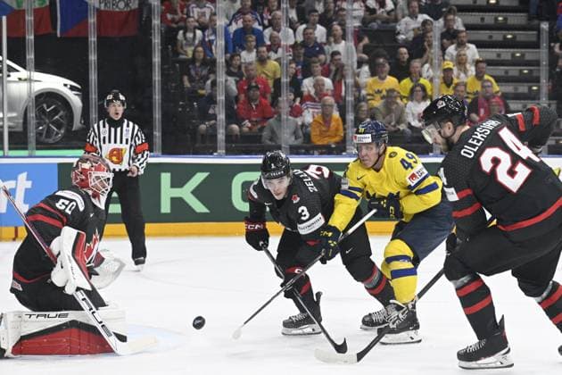 L-R goalkeeper Jordan Binnington (CAN), Olen Zellweger (CAN), Fabian Zetterlund (SWE) and Jamie Oleksiak (CAN) in action during the 2024 IIHF World Championship, WM, Weltmeisterschaft match for the third place, Sweden vs Canada, in Prague, Czech Republic, on May 26, 2024. (CTKxPhoto MichalxKamaryt) CTKPhotoP2024052603629  CTKPhotoP2024052603629