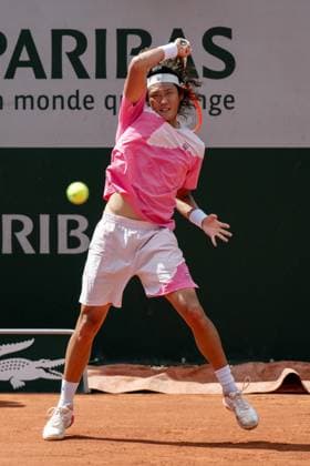 (240526) -- PARIS, May 26, 2024 -- Zhang Zhizhen of China hits a return during the men s singles first round match between Zhang Zhizhen of China and Aleksandar Vukic of Australia at the French Open tennis tournament at Roland Garros, Paris, France, May 26, 2024. ) (SP)FRANCE-PARIS-TENNIS-FRENCH OPEN-MEN S SINGLES MengxDingbo 