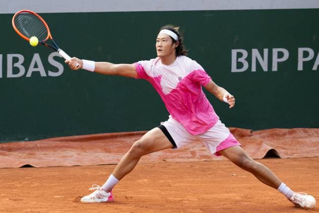 (240526) -- PARIS, May 26, 2024 -- Zhang Zhizhen of China hits a return during the men s singles first round match between Zhang Zhizhen of China and Aleksandar Vukic of Australia at the French Open tennis tournament at Roland Garros, Paris, France, May 26, 2024. ) (SP)FRANCE-PARIS-TENNIS-FRENCH OPEN-MEN S SINGLES MengxDingbo 