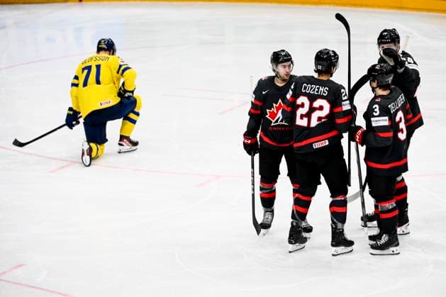 Canadian players, L-R Andrew Mangiapane, Dylan Cozens, Olen Zellweger and Jamie Oleksiak, celebrate a goal (1:1) during the 2024 IIHF World Championship, WM, Weltmeisterschaft match for the third place, Sweden vs Canada, in Prague, Czech Republic, on May 26, 2024. On the left side is seen Victor Olofsson (SWE). (CTKxPhoto OndrejxDeml) CTKPhotoP2024052604083  CTKPhotoP2024052604083
