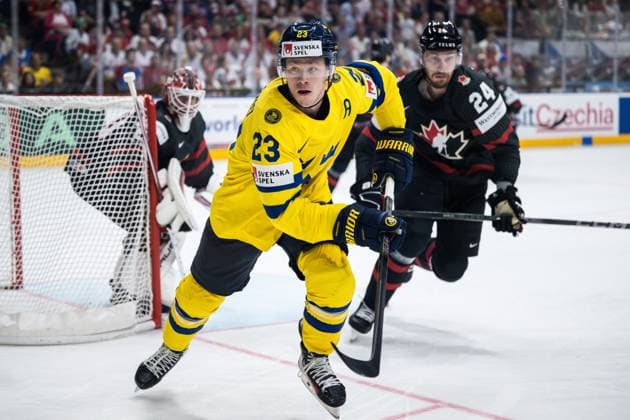 240526 Lucas Raymond of Sweden and Jamie Oleksiak of Canada during the 2024 IIHF Ice Hockey World Championship bronze medal game between Sweden and Canada on May 26, 2024 in Prague Photo Maxim Thore BILDBYRAN kod MT MT0605 ishockey ice hockey ishockey vm sweden canada 2024 iihf ice hockey world championship bbeng bronsmatch sverige kanada  Copyright: MAXIMxTHORE BB240526MT049