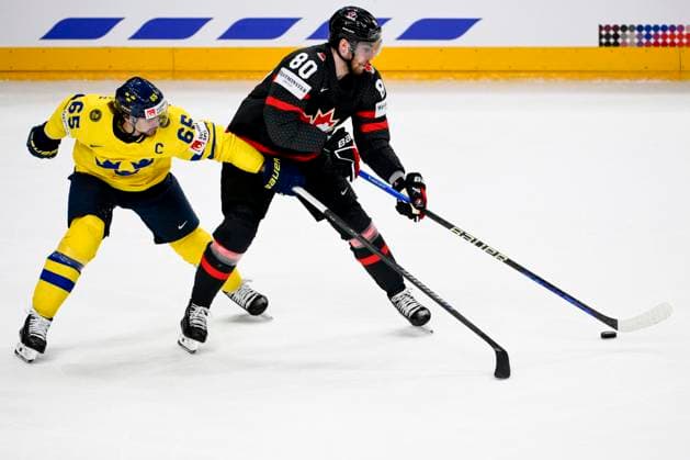 L-R Erik Karlsson (SWE) and Pierre-Luc Dubois (CAN) in action during the 2024 IIHF World Championship, WM, Weltmeisterschaft match for the third place, Sweden vs Canada, in Prague, Czech Republic, on May 26, 2024. (CTKxPhoto OndrejxDeml) CTKPhotoP2024052604188  CTKPhotoP2024052604188