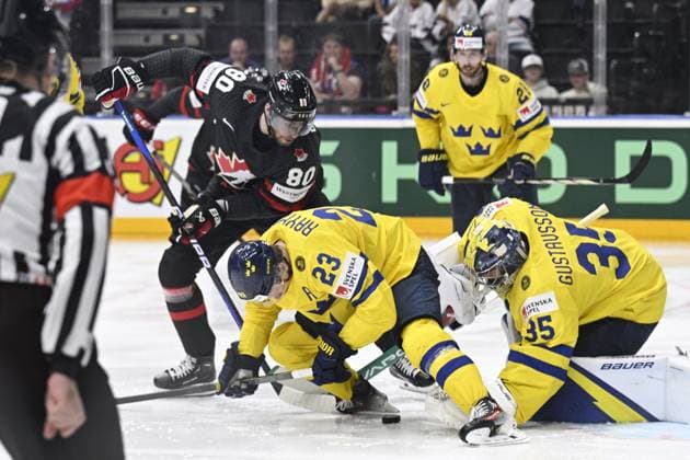 L-R Pierre-Luc Dubois (CAN), Lucas Raymond (SWE), Christoffer Ehn (SWE) and goalkeeper Filip Gustavsson (SWE) in action during the 2024 IIHF World Championship, WM, Weltmeisterschaft match for the third place, Sweden vs Canada, in Prague, Czech Republic, on May 26, 2024. (CTKxPhoto MichalxKamaryt) CTKPhotoP2024052604402  CTKPhotoP2024052604402