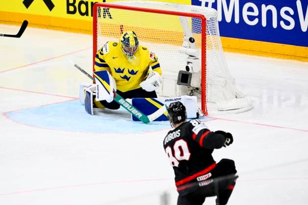 Goalkeeper Filip Gustavsson (SWE), left, gets a goal, Pierre-Luc Dubois (CAN), right, in action during the 2024 IIHF World Championship, WM, Weltmeisterschaft match for the third place, Sweden vs Canada, in Prague, Czech Republic, on May 26, 2024. (CTKxPhoto OndrejxDeml) CTKPhotoP2024052604444  CTKPhotoP2024052604444