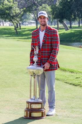 FORT WORTH, TX - MAY 26: Davis Riley (USA) poses with the trophy after winning the Charles Schwab Challenge on May 26, 2024 at Colonial Country Club in Fort Worth, TX. (Photo by George Walker Icon Sportswire) GOLF: MAY 26 PGA, Golf Herren Charles Schwab Challenge EDITORIAL USE ONLY Icon240526098