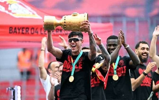 Football, , Germany, Men, Season 2023 2024, Coming Home, BayArena Leverkusen, Bayer Leverkusen celebrates the double Piero Hincapie LEV with the DFB Cup Cheers, Joy, Action DFB DFL REGULATIONS PROHIBIT ANY USE OF PHOTOGRAPHS AS IMAGE SEQUENCES AND OR QUASI VIDEO