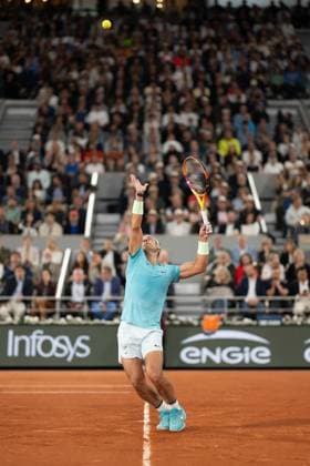 (240527) -- PARIS, May 27, 2024 -- Rafael Nadal of Spain serves to Alexander Zverev of Germany during the men s singles 1st round match at the French Open tennis tournament at Roland Garros, Paris, France, May 27, 2024. ) (SP)FRANCE-PARIS-TENNIS-FRENCH OPEN-MEN S SINGLES MengxDingbo 