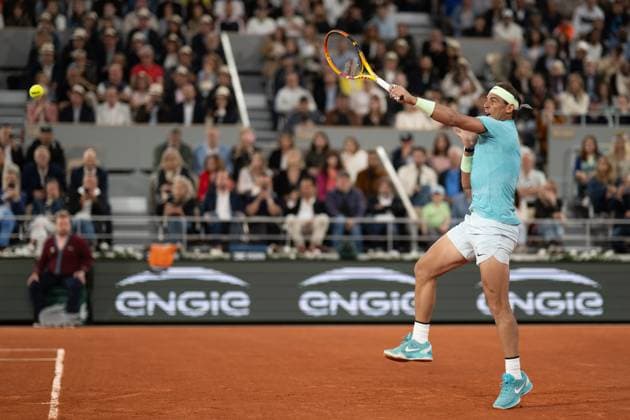 (240527) -- PARIS, May 27, 2024 -- Rafael Nadal of Spain hits a return to Alexander Zverev of Germany during the men s singles 1st round match at the French Open tennis tournament at Roland Garros, Paris, France, May 27, 2024. ) (SP)FRANCE-PARIS-TENNIS-FRENCH OPEN-MEN S SINGLES MengxDingbo 
