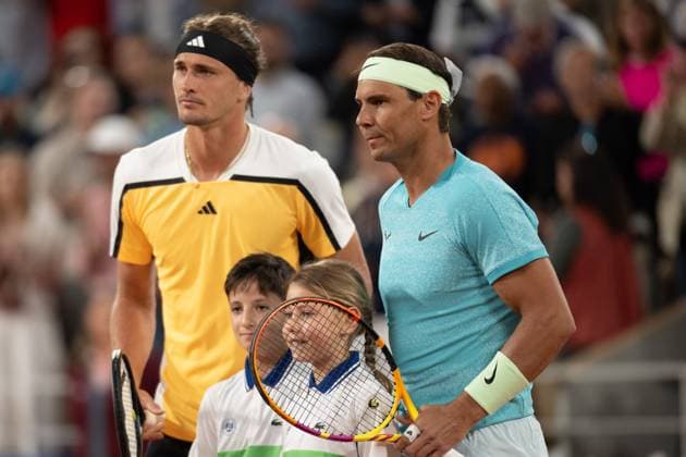 (240527) -- PARIS, May 27, 2024 -- Rafael Nadal (1st R) of Spain and Alexander Zverev (1st L) of Germany pose for photograph before the men s singles 1st round match at the French Open tennis tournament at Roland Garros, Paris, France, May 27, 2024. ) (SP)FRANCE-PARIS-TENNIS-FRENCH OPEN-MEN S SINGLES MengxDingbo 