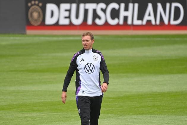 National coach Julian NAGELSMANN GER walks across the pitch, single image, cropped single motif, half figure, half figure public training in Jena, Erst Abbe Sportfeld German national football team, football training camp in Blankenhain Thuringia on 27 05 2024,
