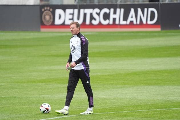 National coach Julian Nagelsmann Germany Germany with his tactics sheet for Germany Jena 27 05 2024 Public training camp for the German national team in preparation for the European Championship, Ernst Abbe Sportfeld