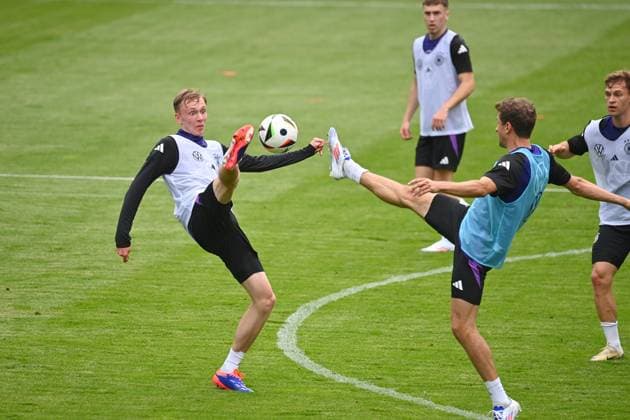 Thomas MUELLER MÜLLER , action,duel against Maximilian BEIER public training in Jena , Ernst Abbe sports field German national soccer team,soccer training camp in Blankenhain Thuringia on 27 05 2024,