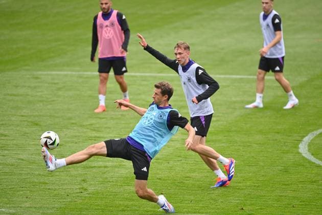 Thomas MUELLER MÜLLER , action,duel against Maximilian BEIER public training in Jena , Ernst Abbe sports field German national soccer team,soccer training camp in Blankenhain Thuringia on 27 05 2024,