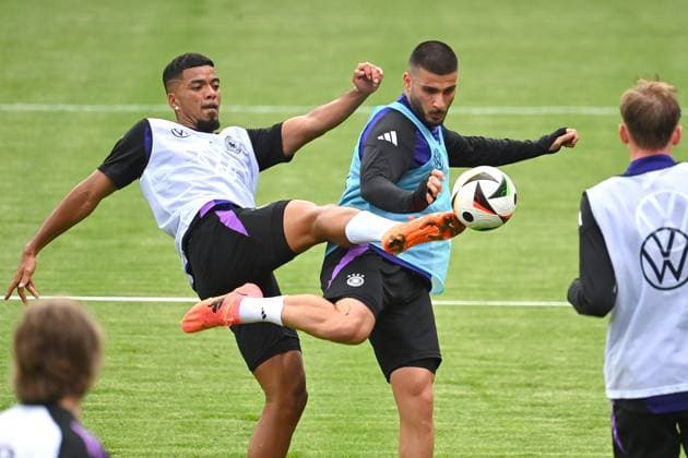 Benjamin HENRICHS, action,duel against Deniz UNDAV public training in Jena , Ernst Abbe sports field German national soccer team,soccer training camp in Blankenhain Thuringia on 27 05 2024,