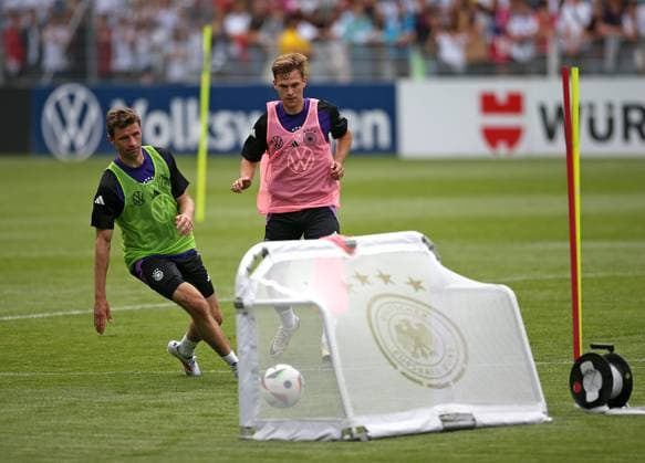 27 05 2024, Football, European Championship 2024, Preparatory training camp of the German national team in Blankeinhain Thuringia Public training in the ad hoc Arena in the Ernst Abbe Sportfeld Jena L R Thomas Müller Germany , Joshua Kimmich Germany DFL and DFB regulations prohibit any use of photographs as image sequences and or quasi video