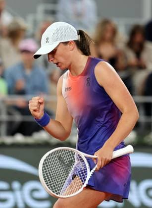 Top-seeded Iga Swiatek of Poland plays against Leolia Jeanjean of France during their first round match of the French Tennis Open at Roland Garros in Paris, France, on Monday, May 27, 2024. Swiatek won 6-1, 6-2.  PAR20240527148 MAYAxVIDON-WHITE
