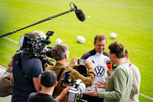 Jena , 270524 , 15,000 fans celebrate the DFB team at the public training in Jena In the picture national coach Julian Nagelsmann in an interview with Lutz van der Horst and Fabian Köster, German comedy author, comedian and TV presenter in the heute show on ZDF