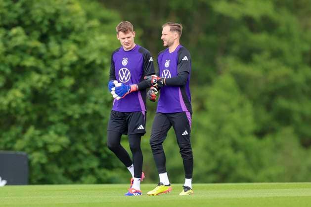 Goalkeeper Alexander Nuebel and goalkeeper Oliver Baumann talk, training camp of the German national team, Blankenhain, Germany