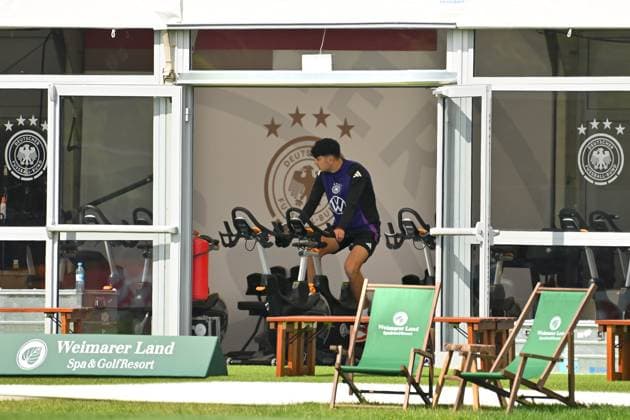 Aleksandar PAVLOVIC Bayern Muenchen trains in the tent on the bike ergometer, training at the Golf Resort Weimarer Land, training ground German national soccer team, soccer training camp in Blankenhain Thuringia on 27 05 2024,