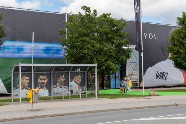 Report 28 05 2024 adidas in Herzogenaurach prepares for the arrival of the mens national team The bus stop in front of the Brand store is also occupied by national team players Herzogenaurach Bavaria Germany