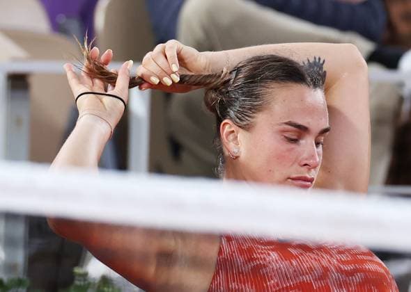 (240529) -- PARIS, May 29, 2024 -- Aryna Sabalenka of Belarus reacts during the women s singles first round match between Aryna Sabalenka of Belarus and Erika Andreeva of Russia at the French tennis tournament at Roland Garros in Paris, France, on May 28, 2024. ) (SP)FRANCE-PARIS-TENNIS-FRENCH OPEN-WOMEN S SINGLES GaoxJing 