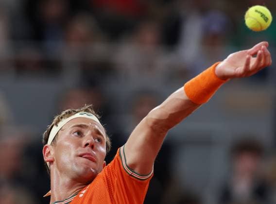 (240529) -- PARIS, May 29, 2024 -- Casper Ruud of Norway serves during the men s singles first round match between Casper Ruud of Norway and Felipe Meligeni Alves of Brazil at the French tennis tournament at Roland Garros in Paris, France, on May 28, 2024. ) (SP)FRANCE-PARIS-TENNIS-FRENCH OPEN-MEN S SINGLES GaoxJing 