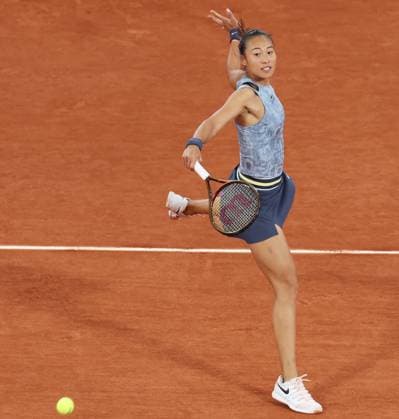Tennis, French Open, Tag 3 (240529) -- BEIJING, May 29, 2024 -- Zheng Qinwen of China hits a return during the women s singles first round match against Alize Cornet of France at the French tennis tournament at Roland Garros in Paris, France, on May 28, 2024. ) XINHUA PHOTOS OF THE DAY GaoxJing 