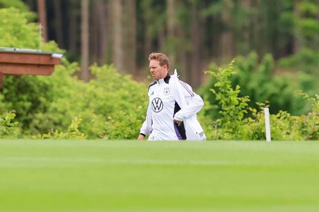 National coach Julian Nagelsmann walks across the training ground, training day 3, training camp of the German national team, Spa and GolfResort Weimarer Land, 29 05 2024, Blankenhain, Germany