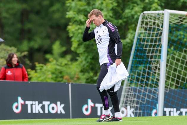 National coach Julian Nagelsmann walks across the training ground, training day 3, training camp of the German national team, Spa and GolfResort Weimarer Land, 29 05 2024, Blankenhain, Germany