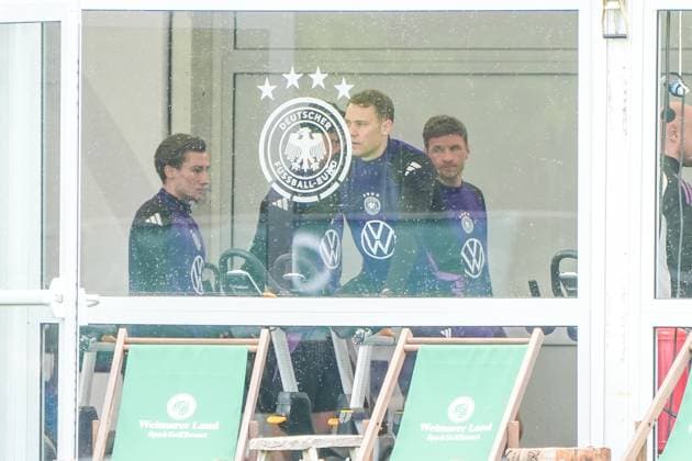 Goalkeeper Manuel Neuer Germany Germany trains on the ergometer in the fitness tent on his first day in the training camp, behind him Thomas Müller Germany Germany , Brajan Gruda Germany Germany Blankenhain 29 05 2024 Training camp of the German national team for the European Championship preparation, Golf Resort Weimarer Land