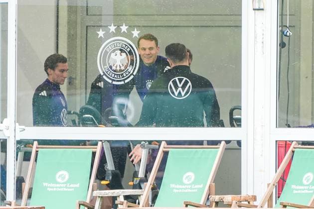 Goalkeeper Manuel Neuer Germany Germany trains on the ergometer in the fitness tent on his first day in the training camp, behind him Thomas Müller Germany Germany , Brajan Gruda Germany Germany Blankenhain 29 05 2024 Training camp of the German national team for the European Championship preparation, Golf Resort Weimarer Land