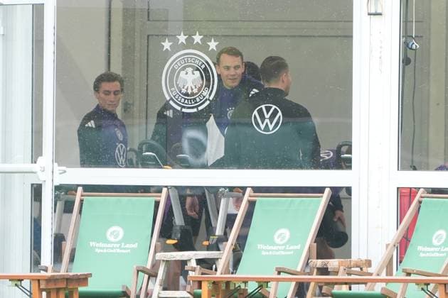 Goalkeeper Manuel Neuer Germany Germany trains on the ergometer in the fitness tent on his first day in the training camp, behind him Thomas Müller Germany Germany , Brajan Gruda Germany Germany Blankenhain 29 05 2024 Training camp of the German national team for the European Championship preparation, Golf Resort Weimarer Land