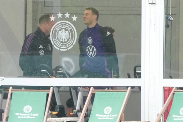 Goalkeeper Manuel Neuer Germany Germany trains on the ergometer in the fitness tent on his first day in the training camp, behind him Thomas Müller Germany Germany , Brajan Gruda Germany Germany Blankenhain 29 05 2024 Training camp of the German national team for the European Championship preparation, Golf Resort Weimarer Land
