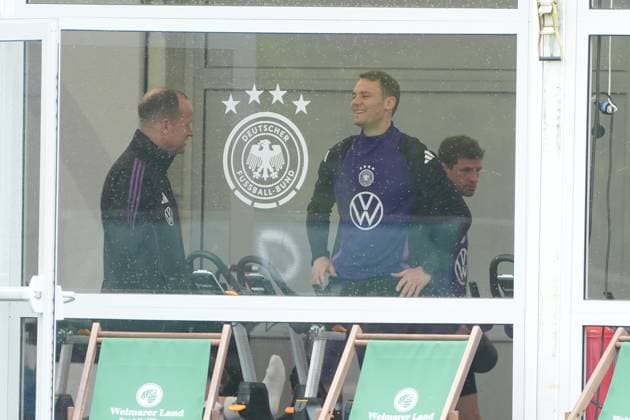 Goalkeeper Manuel Neuer Germany Germany trains on the ergometer in the fitness tent on his first day in the training camp, behind him Thomas Müller Germany Germany , Brajan Gruda Germany Germany Blankenhain 29 05 2024 Training camp of the German national team for the European Championship preparation, Golf Resort Weimarer Land