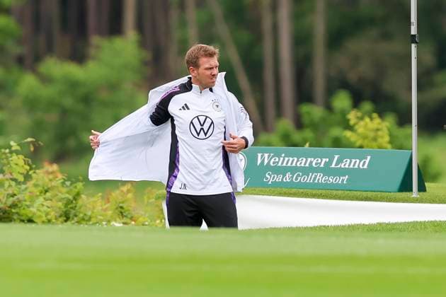 German national coach Julian Nagelsmann stands next to a sign of the Spa and GolfResort Weimarer Land, Training day 3, training camp of the German national team, Spa and GolfResort Weimarer Land, 29 05 2024, Blankenhain, Germany