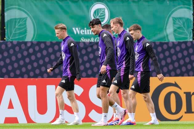 Chris Fuehrich, Aleksandar Pavlovic, Maximilian Beier and Brajan Gruda enter the training ground, training day 3, training camp of the German national team, Spa and GolfResort Weimarer Land, 29 05 2024, Blankenhain, Germany