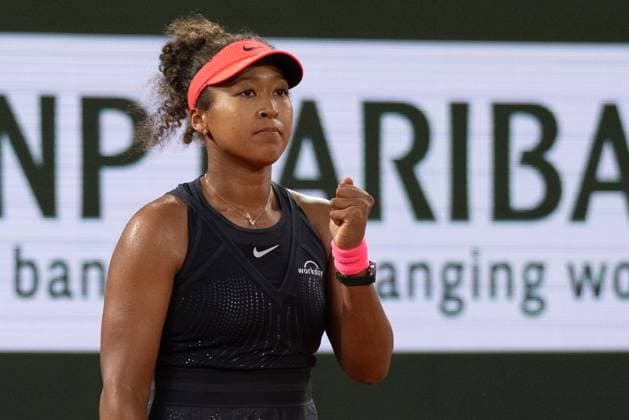 (240530) -- PARIS, May 30, 2024 -- Osaka Naomi celebrates during the women s singles second round match between Iga Swiatek of Poland and Osaka Naomi of Japan at the French Open tennis tournament at Roland Garros, Paris, France, May 29, 2024. ) (SP)FRANCE-PARIS-TENNIS-FRENCH OPEN-WOMEN S SINGLES MengxDingbo 