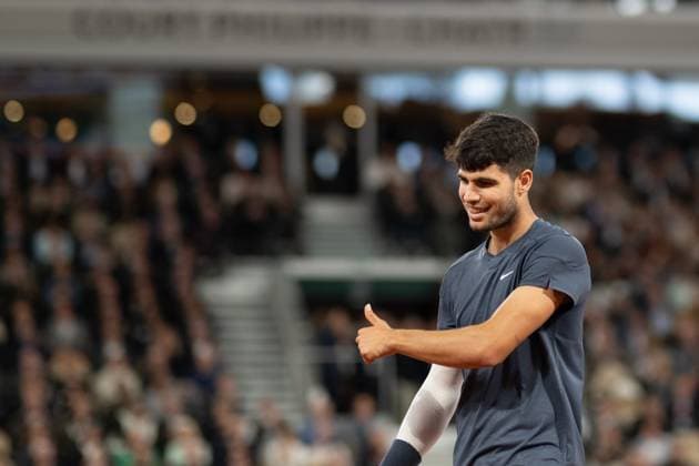 (240530) -- PARIS, May 30, 2024 -- Carlos Alcaraz reacts during the men s singles second round match between Carlos Alcaraz of Spain and Jesper de Jong of the Netherlands at the French Open tennis tournament at Roland Garros, Paris, France, May 29, 2024. ) (SP)FRANCE-PARIS-TENNIS-FRENCH OPEN-MEN S SINGLES MengxDingbo 